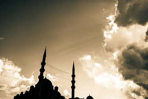Silhouette of the mosque with cloudy sky Stock Photos