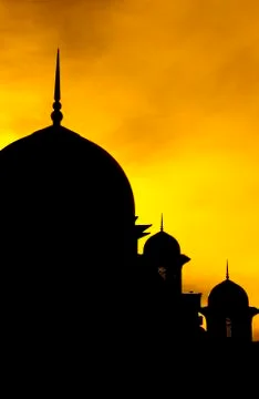 Silhouette of a mosque Stock Photos