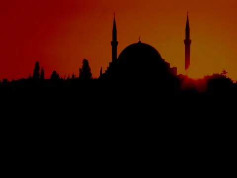 Silhouette of a mosque Stock Photos