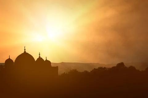 Silhouette of a mosque Stock Photos