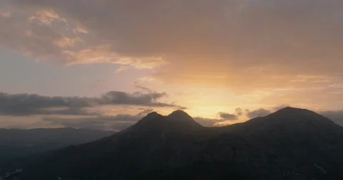 Silhouette of mountains against the background of the setting sun. Spain Stock Footage 220738467
