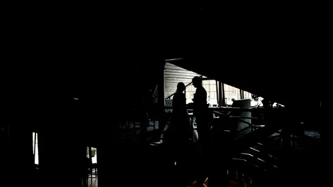 The silhouette of the newlyweds in the attic Stock Footage 106674597