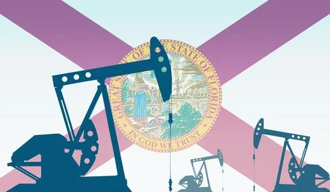 Silhouette of oil pump against flag of Florida state USA. Extraction grade cr Stock Illustration