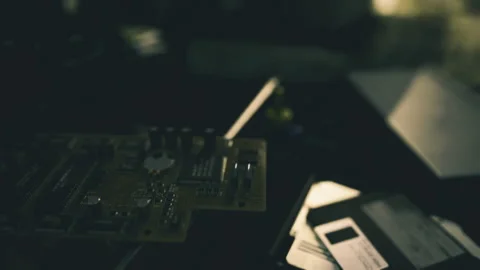 Silhouette of old computer hardware with artistic bokeh effects and muted colors Stock Footage 341591103