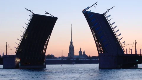 Silhouette of opened Palace Bridge and Chapel of Peter and Paul fortress Stock Footage 85007136
