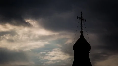 Silhouette of orthodox chirch on a background of clouds dramatic  timelapse Stock-Footage 83430757