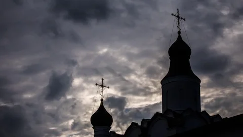 Silhouette of orthodox chirch on a background of clouds timelapse 스톡 동영상 83430760