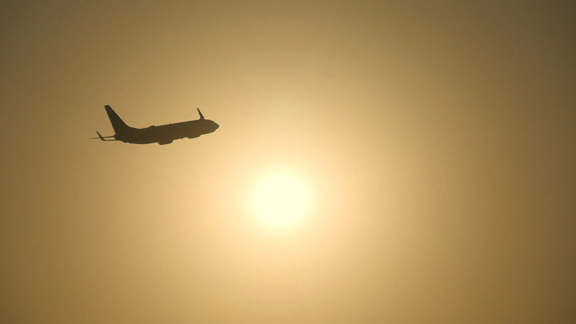 Silhouette of passenger airplane flies a... | Stock Video | Pond5