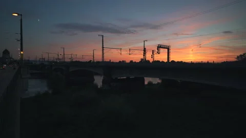 Silhouette of passing freight train at sunset Stock Footage 204123646