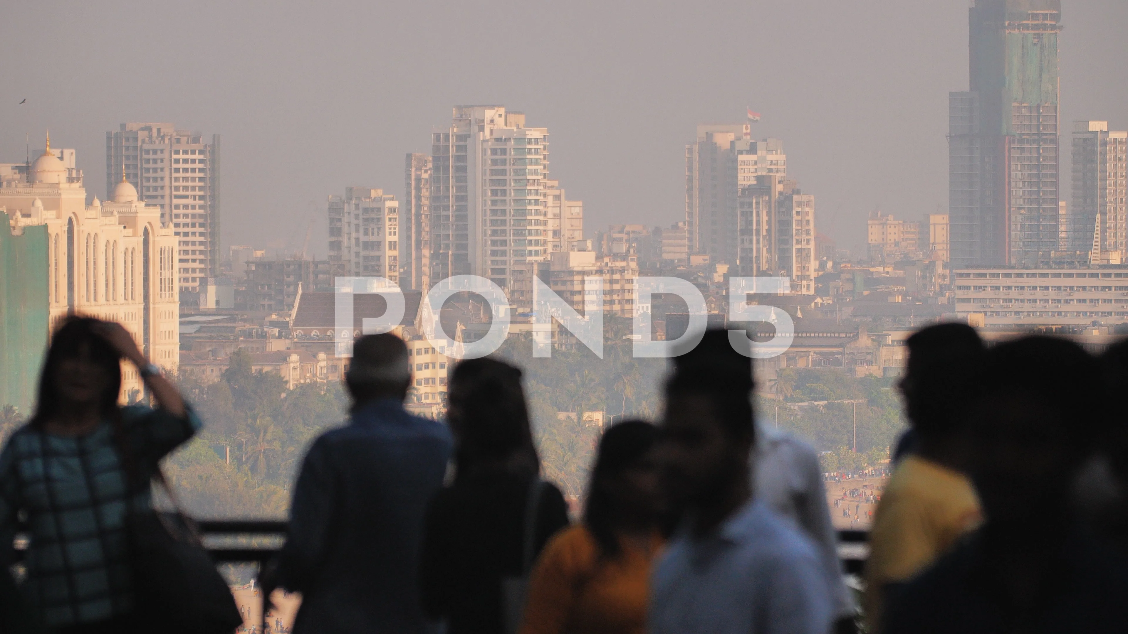 Silhouette of people in Mumbai on the ba... | Stock Video | Pond5