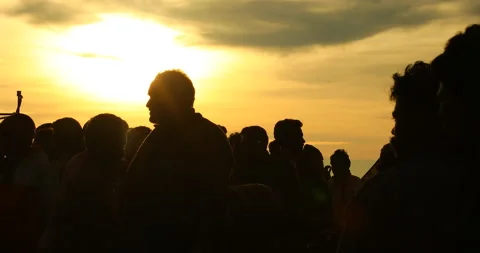 Silhouette of people in sunset Stock Footage 327080581