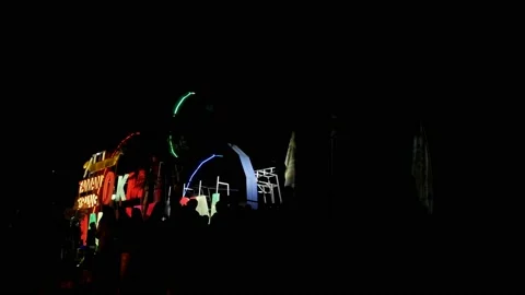 Silhouette of people walking in the front Zero Kilometer light sign Stock Footage 141297058