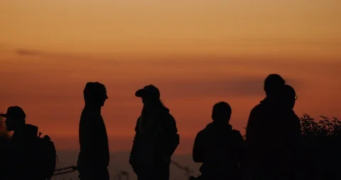 Silhouette of people watching the Lunar Eclipse in Los Angeles, California Stock Footage 99158927