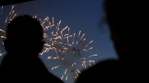 Silhouette people watching stand firework closeup background of night sky 4K. Stock Footage 114367758