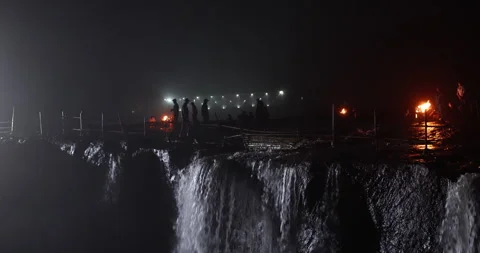 Silhouette of people at waterfall 스톡 동영상 340353356