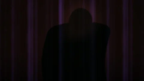 Silhouette of a person in darkness. 스톡 동영상 335427313
