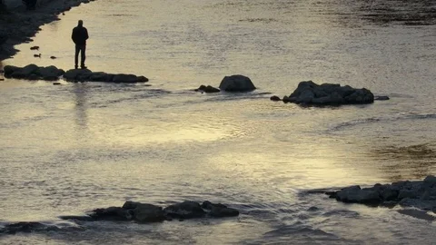 Silhouette of person on river Stock Footage 71781563