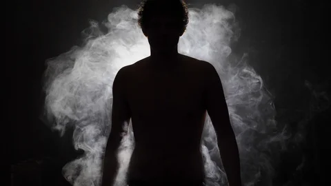 Silhouette person in smoke Near Death Experience Cine 4K Ultra HD Stock Footage