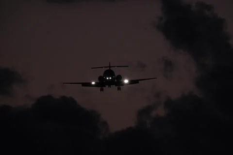 Silhouette of a plane Stock Photos