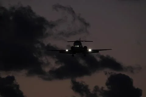 Silhouette of a plane Stock Photos