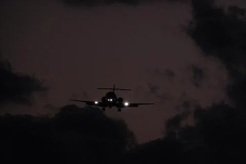 Silhouette of a plane Stock Photos