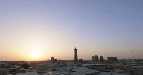 Silhouette of Po-i-Kalyan complex at sunset. Ancient part of Bukhara, Uzbekistan Stock Footage 272503076