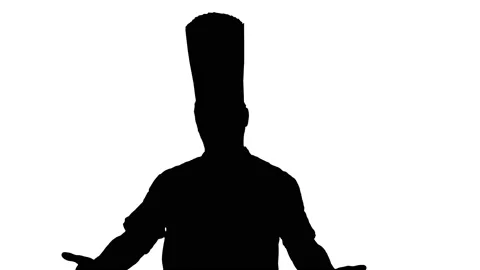 Silhouette Professional chef man making welcome gesture to camera. Stock Footage 151206645