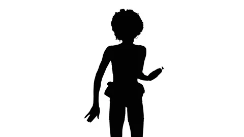 Silhouette of a professional dancer doing sensual body moments, turning round. Video stock 132882290