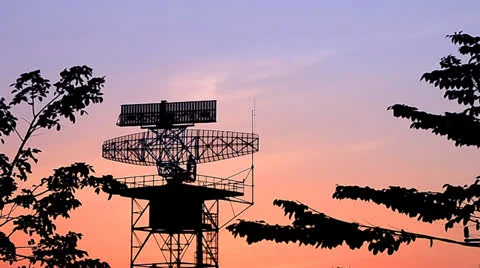 Silhouette radar tower communication and plane Stock Footage 22994738