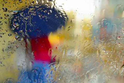 Silhouette in the rain Stock Photos