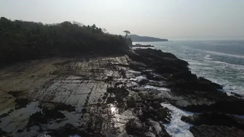 Silhouette rock beach Stock Footage 130962825