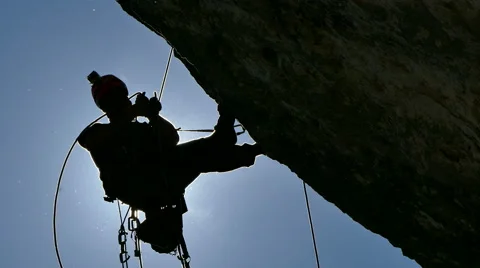 Silhouette of a Rock Climber Stock Footage 62421133