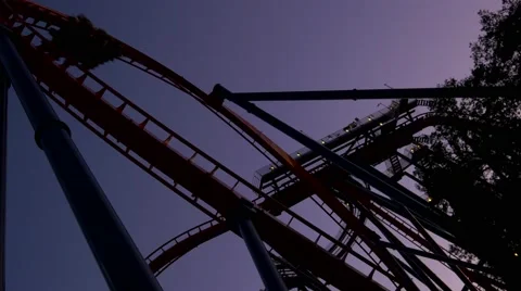 Silhouette roller coaster against purple sky, 4K Stock Footage 59520957