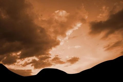 Silhouette of rolling dunes is spanning width in minimalist flat design, with Stock Photos