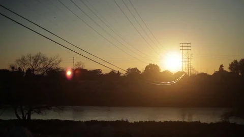 Silhouette of Runner Against Sunset Video stock 76015075