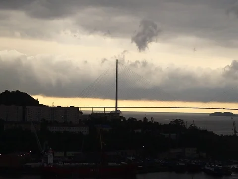 Silhouette of the Russian bridge on a background of cloudy sky. 库存影片 117749020