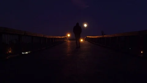 silhouette sad man walking