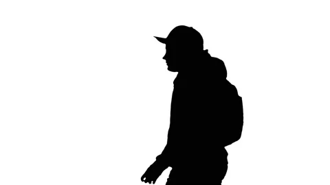 Silhouette Schoolboy with backpack walking by. Stock Footage 151206613