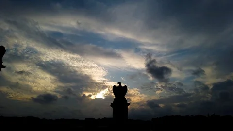 Silhouette of a sculpture of an eagle of Rome. Motion lapse Stock Footage 124924989