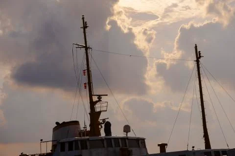 Silhouette of Ship Masts and Funnel Stock Photos
