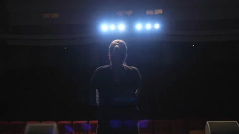 Silhouette of singer on stage. Video stock 104232565