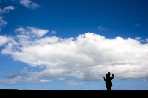Silhouette in the sky Photos
