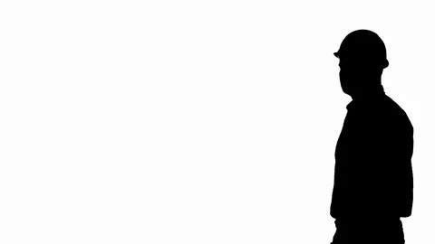 Silhouette Smiling construction worker in yellow helmet looking at perfect well Stock Footage 106088754