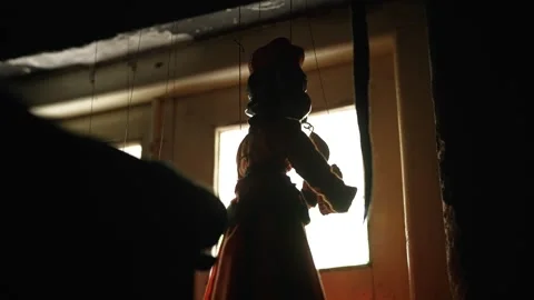 Silhouette of Snake Charmer Puppet Backstage Video stock 310730741