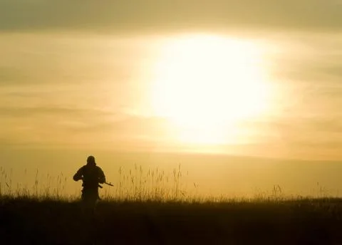 Silhouette of soldier Stock Photos