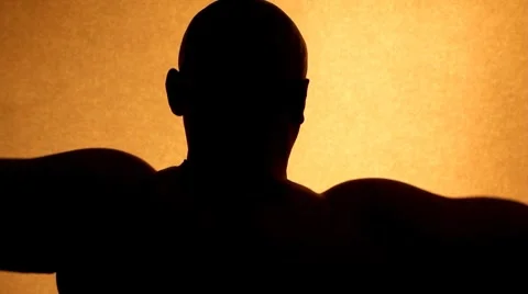 Silhouette strong man 스톡 동영상 8608092