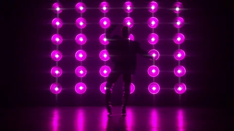 Silhouette of stylish professional dancer performing Sexy Pop dance moves 4K Stock-Footage 237468173