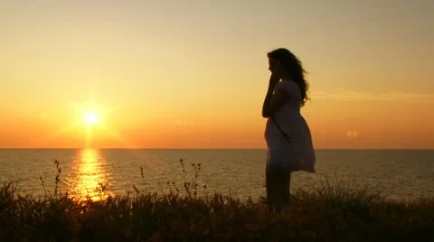 Silhouette at sunset Stock Footage 21374911