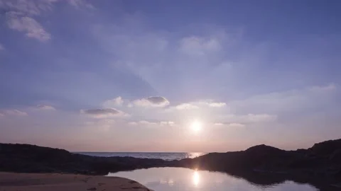 Silhouette sunset at the horizon. sun clouds reflection in the water. abstrac Stock Footage 166930196