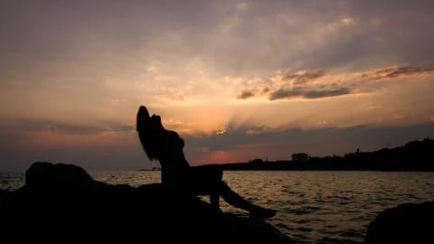 Silhouette at sunset Stock Photos